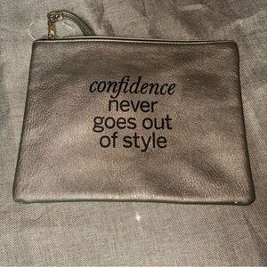 Cosmetic case logo “confidence never goes out of style”